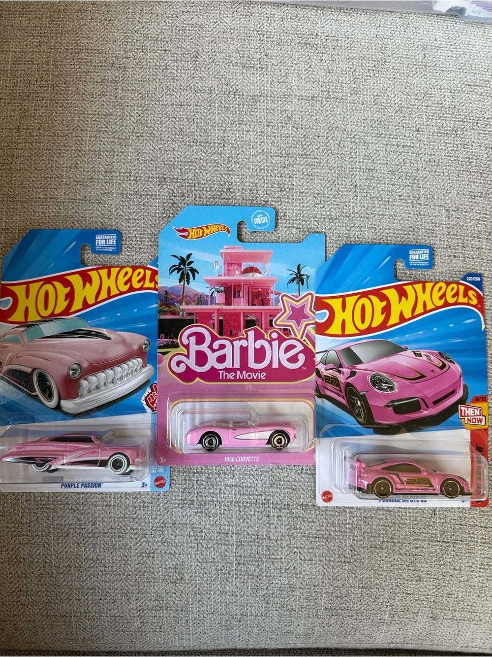 3 pink Hot Wheels